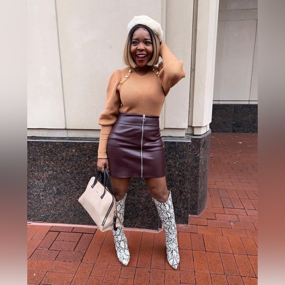 Beautiful brown full front zip and sleek mini length.